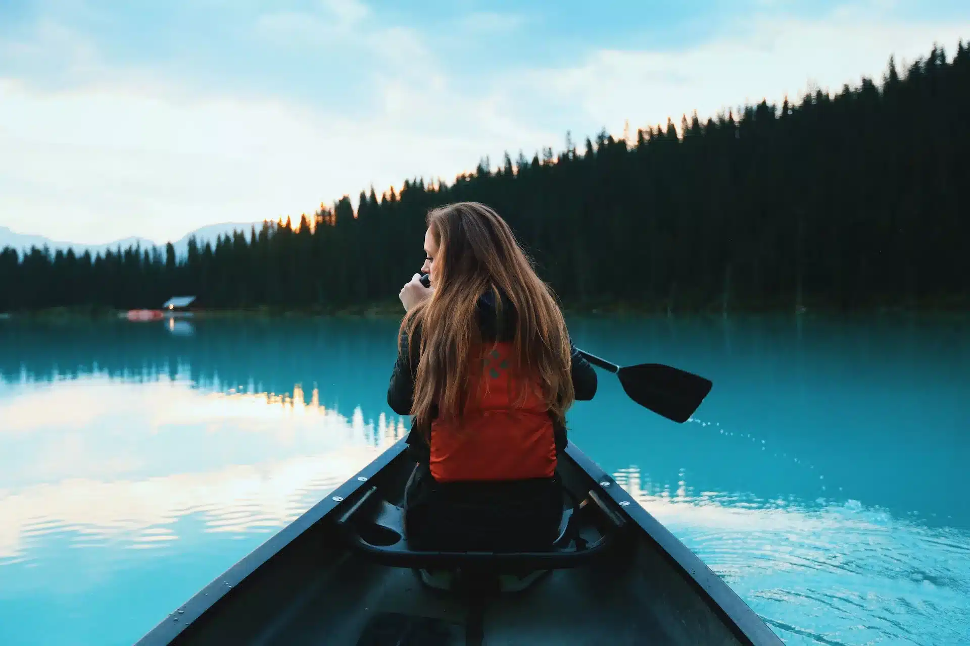 woman paddling on a boat